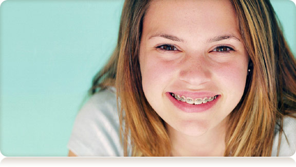 smiling girl with braces