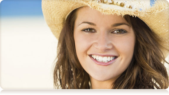 smiling woman in straw hat