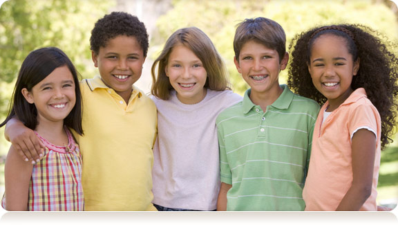 smiling group of young kids