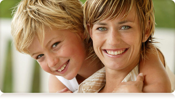 smiling woman and young boy